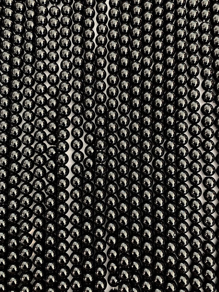 Onyx A perles 6mm sur fil 40cm chez Arabesk