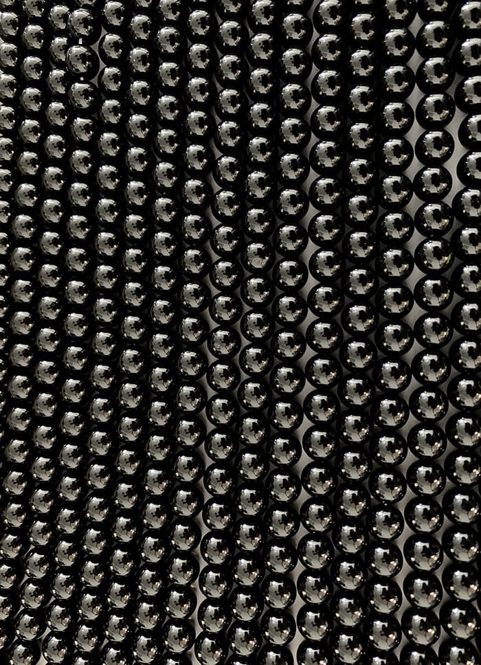 Onyx A perles 8mm sur fil 40cm chez Arabesk