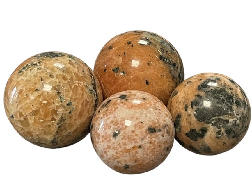 4 Sphères Calcite orange polies 1.48kg
