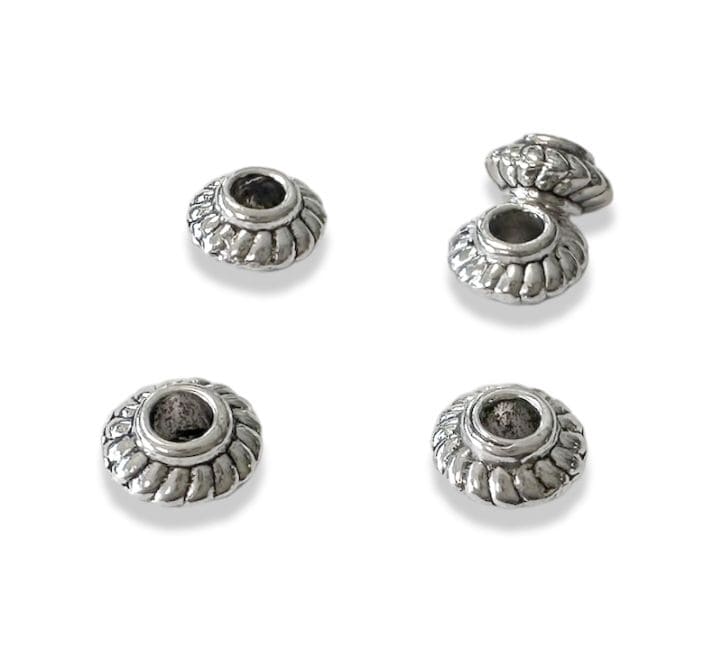 Perles charm's Intercalaire Toupie Argentée 6mm x100