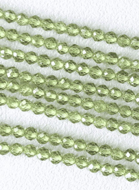 Facettierte Peridot AA-Perlen 3 mm auf 40 cm Draht