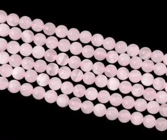 Calcite Rose AA 6mm sur fil 40cm