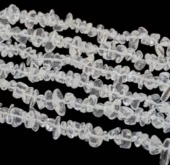 Cristal de Roche chips A 6-12mm sur fil 80cm