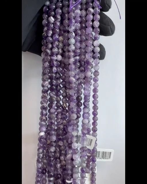 Améthyste rubanée A perles 6mm sur fil 40cm