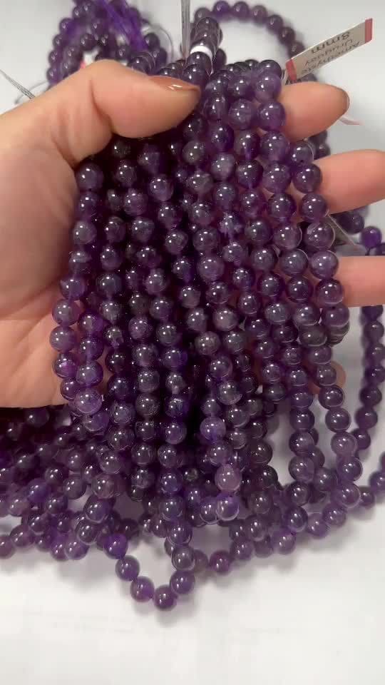 Amethyste Uruguay A perles 8mm sur fil 40cm