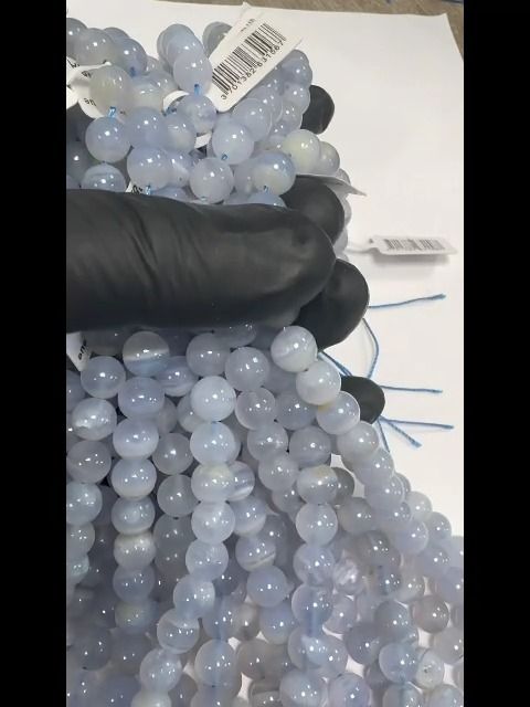 Calcédoine Bleue Rubanée A perles 8mm sur fil 40cm
