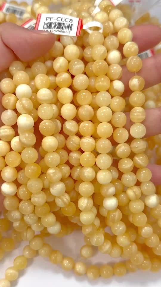 Calcite Orange perles 8-8.5mm sur fil 40cm