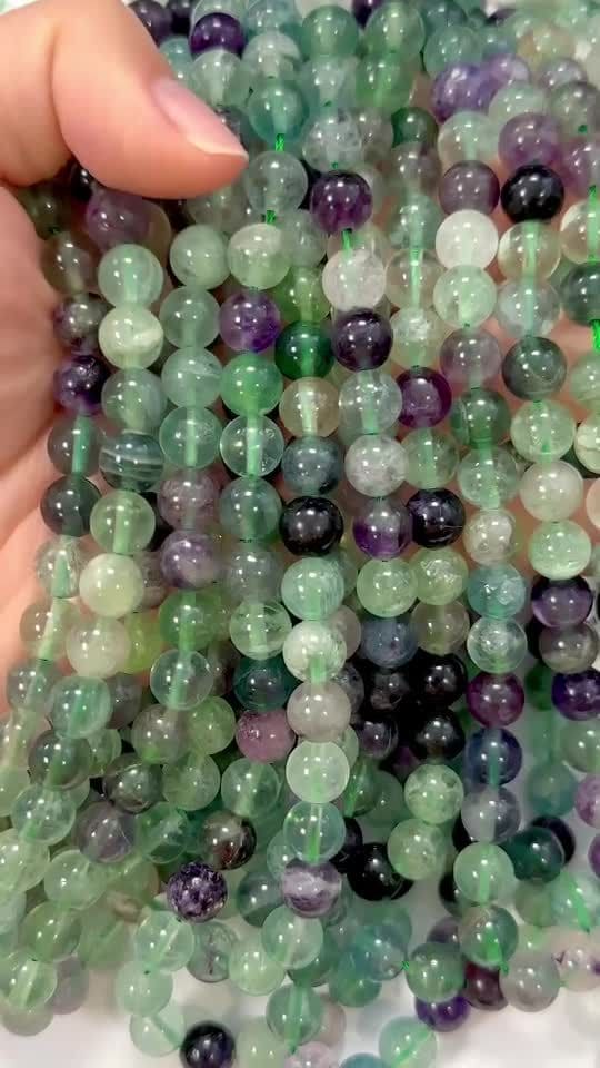 Fluorite A perles 8mm sur fil 40cm