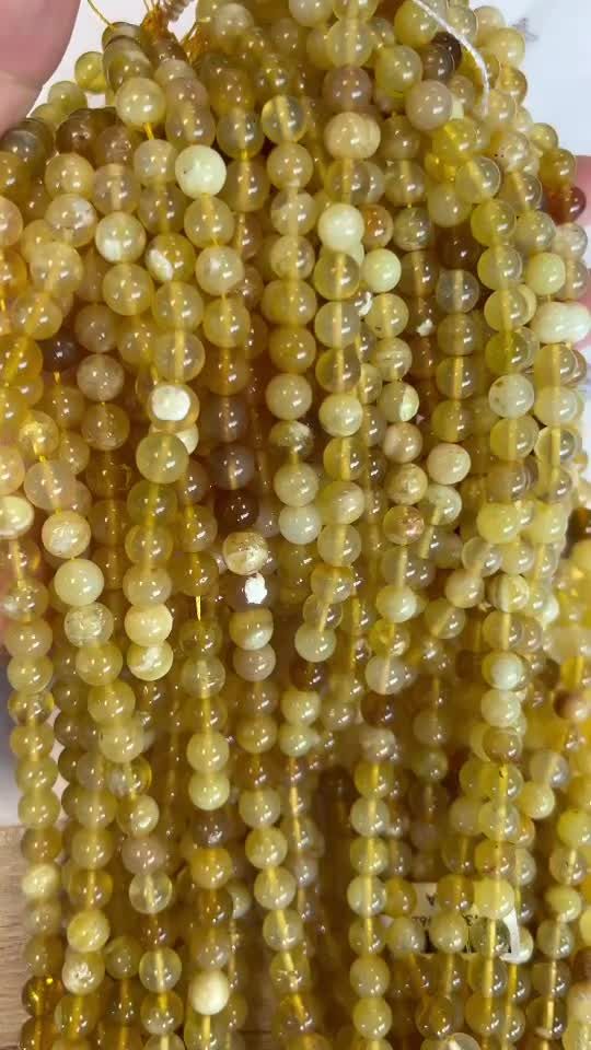 Opale Jaune A perles 8mm sur fil 40cm