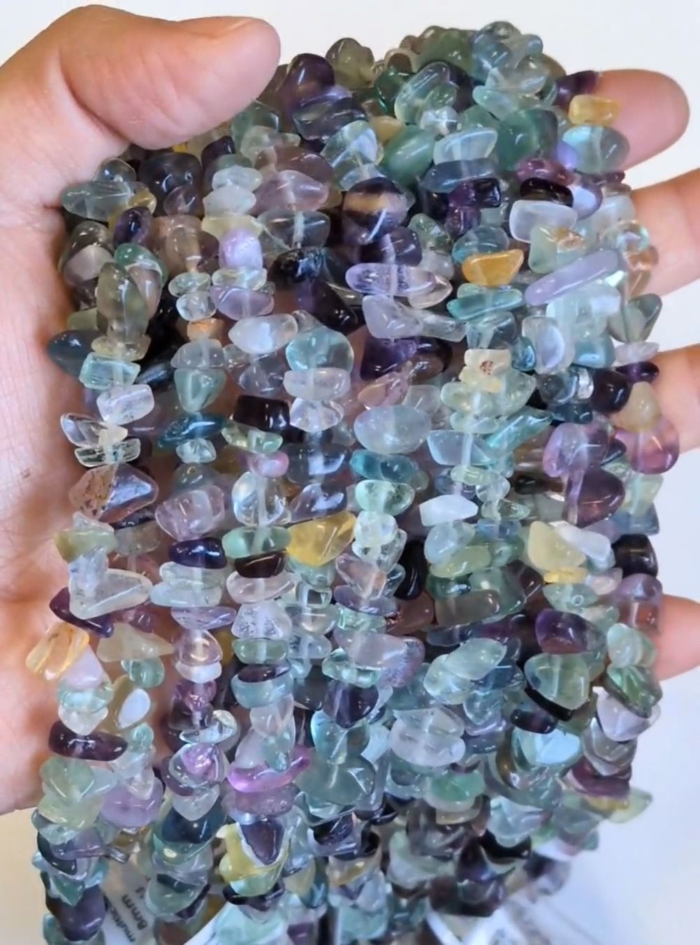 Fluorite multicolore AA chips 3-8mm sur fil 80cm